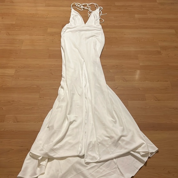 Brand new white halter gown with tie in back . Zipper in back with - Picture 5 of 15